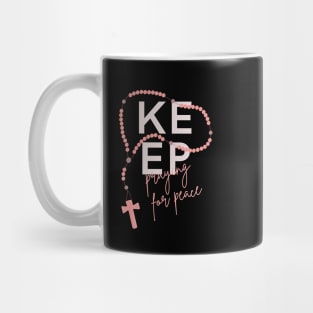 Keep Praying for Peace typography and rosary beads Mug